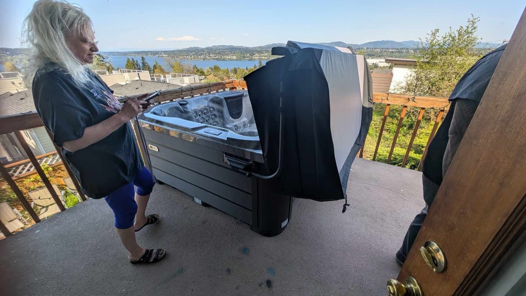 Hot tub on a balcony with a view of the water