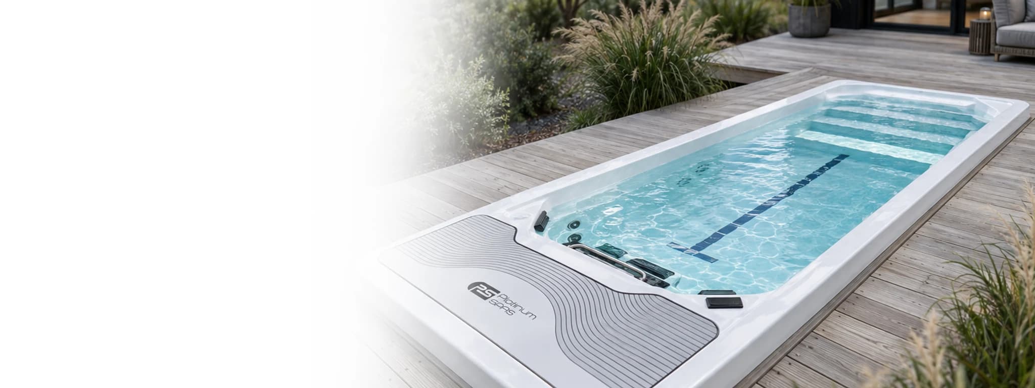 Platinum Spas Chronos mini pool set into a grey wood deck