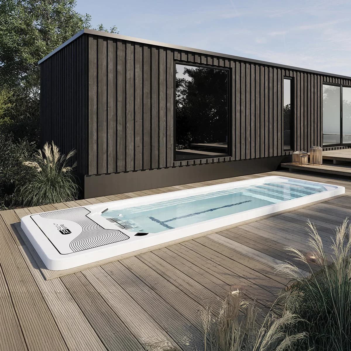 Platinum Spas Chronos mini pool set into a wood deck beside a modern garden room