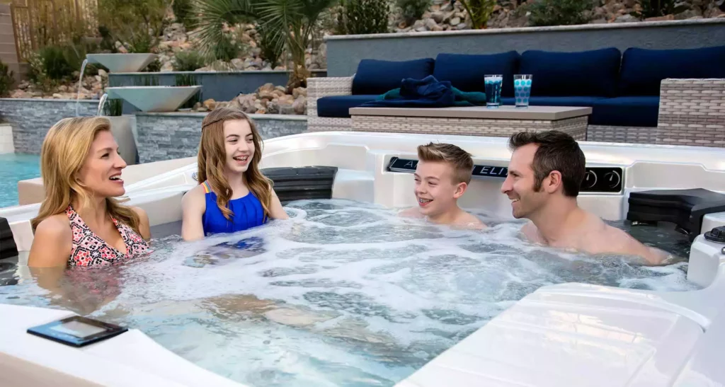 6-person hot tub with young family enjoying the water